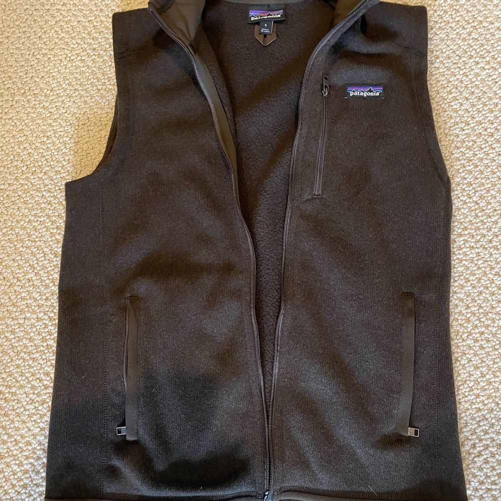 Very nice Patagonia vest.  Barely worn in great condition. Small. Brown.